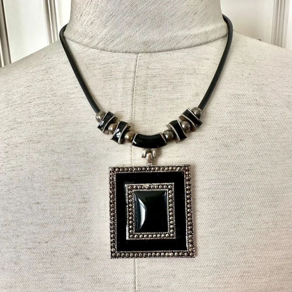Black silver tone pendant necklace